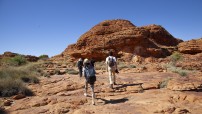 Tourists exploring Kings Canyon at Watarrka National Park