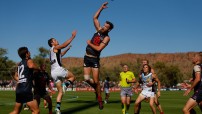Melbourne Demons Team Playing in Alice Springs