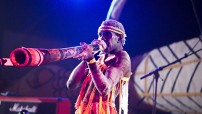 Indigenous Man Playing Didgeridoo