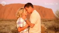 image of couple in front of Uluru