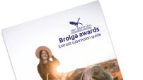 Picture of girl riding camel with a 2021 Brolga awards logo in top right