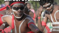 Aboriginals men in ceremonial dress dancing