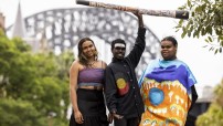 image of three Aboriginal musicians under harbour bridge
