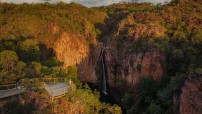 aerial image of Tolmer Falls with people standing on lookout