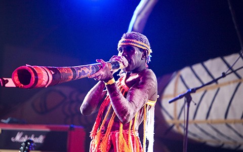 Indigenous Man Playing Didgeridoo