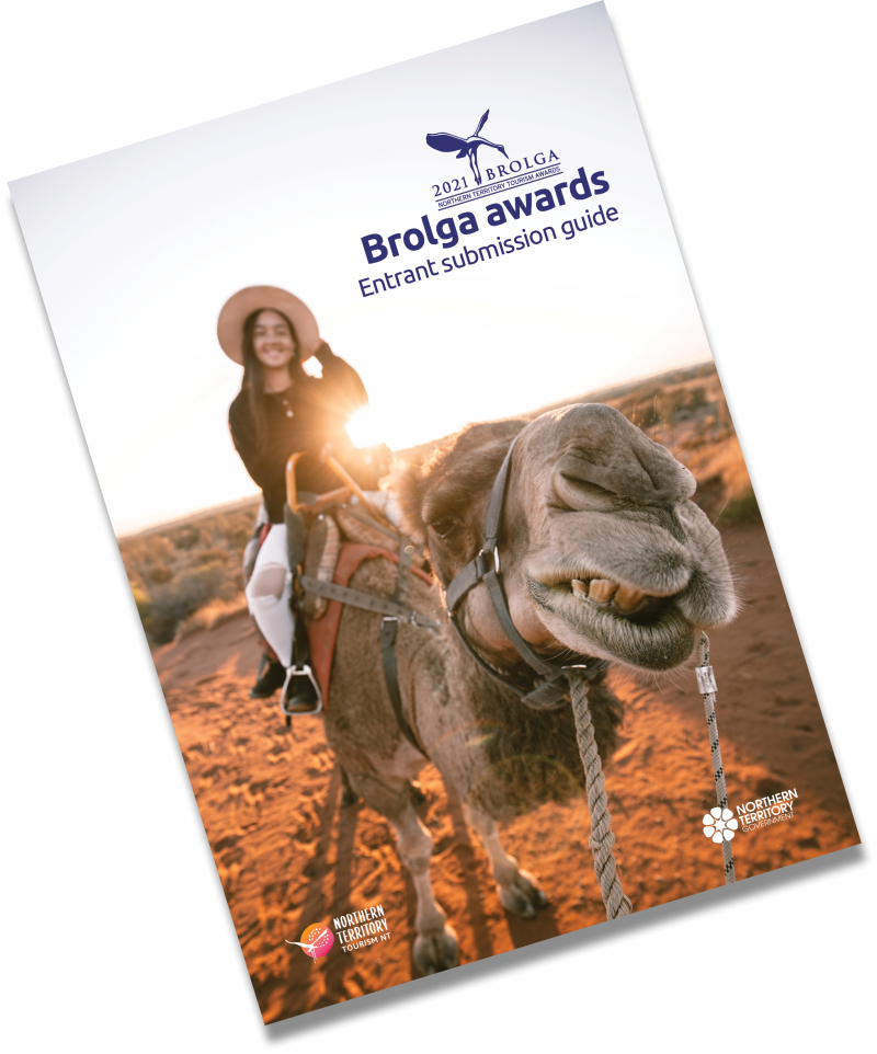 Picture of girl riding camel with a 2021 Brolga awards logo in top right