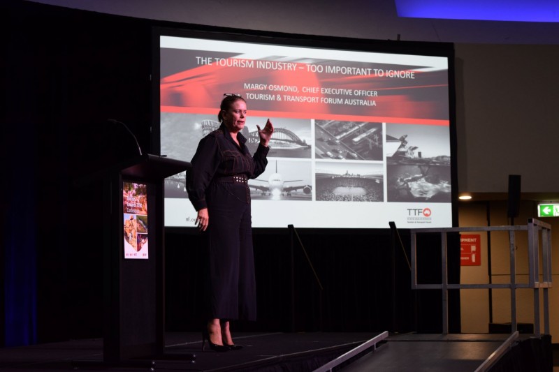 Image of women presenting with screen behind