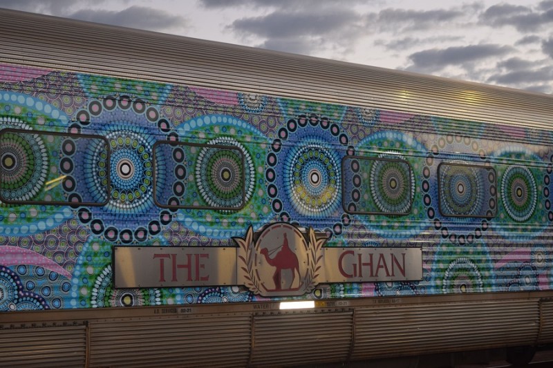 Image of The Ghan train with Aboriginal artwork dot painting