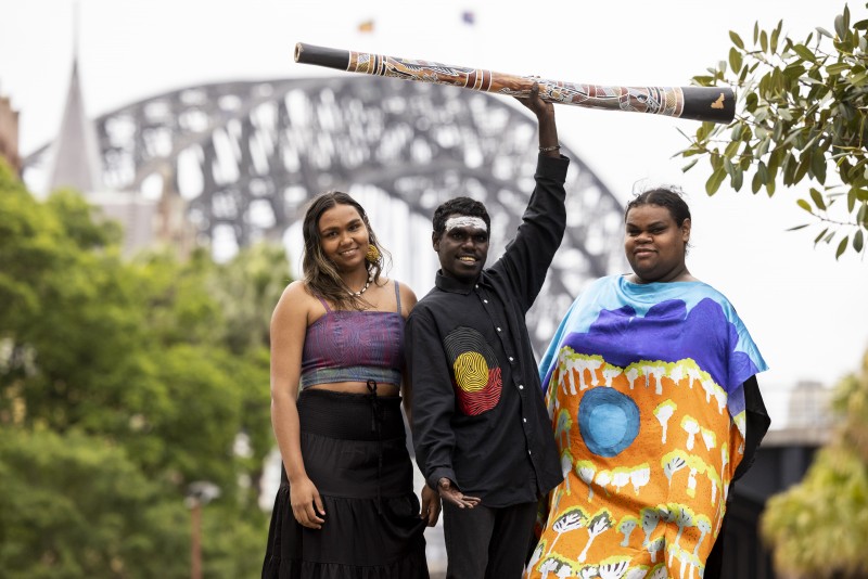image of three Aboriginal musicians under harbour bridge