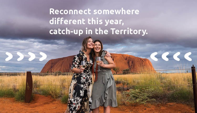 Two women reconnecting at Uluru