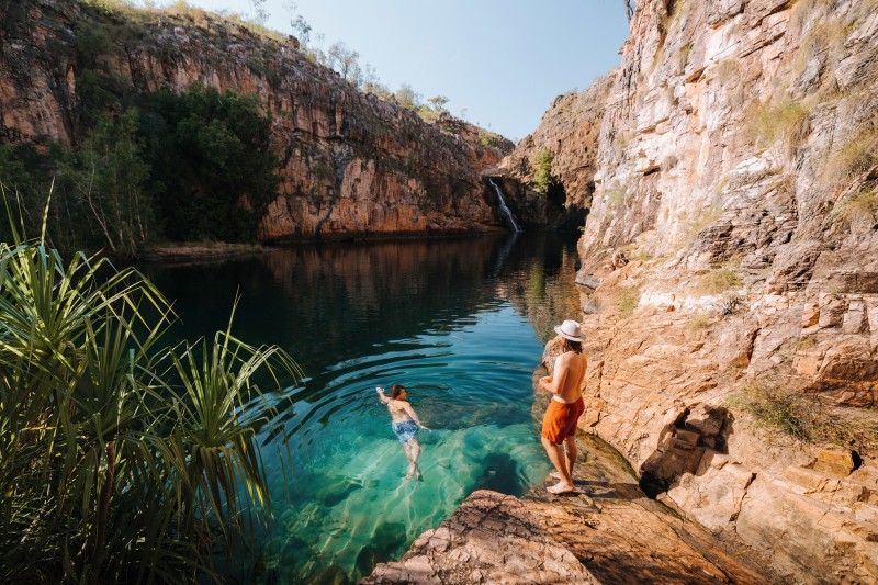 Two men swimming at Maguk in Kakadu